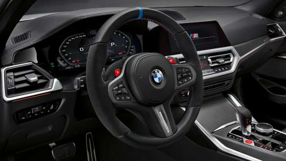M Performance steering wheel Pro BMW M4 Competition Convertible with M xDrive G83 2021 BMW M4 Competition Convertible with M xDrive G83 2021 M Performance steering wheel Pro interior close-up