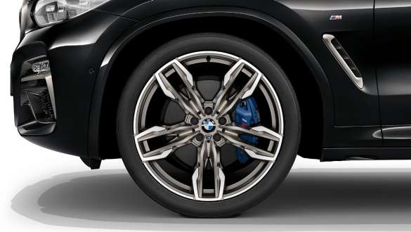 BMW X3 M40i and BMW X3 M40d, M Sport brakes. BMW X3 M40i and BMW X3 M40d in Black Sapphire metallic, exterior, light alloy wheel with M Sport brake.