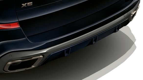 M Sport exhaust system BMW X5 M50i and M50d G05 M Sport exhaust system BMW X5 M50i and M50d G05 2018 SUV close-up rear view