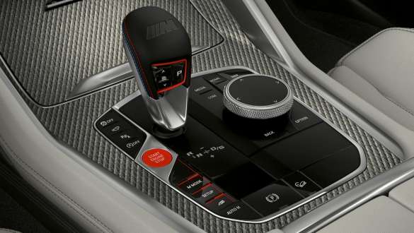 BMW X5 M Competition with M Steptronic transmission F95 8-speed M Steptronic transmission with Drivelogic BMW X5 M Competition F95 2020 SUV interior close-up gear selector