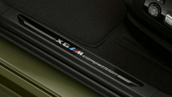 Door sill finishers with “X6 M Competition” designation in the BMW X6 M Competition F96 Door sill finishers with “X6 M Competition” designation BMW X6 M Competition F96 2020 SUV close-up