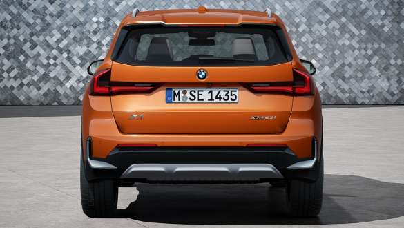 BMW X1 xDrive23i U11 ICE xLine rear view Rear view BMW X1 xDrive23i U11 ICE xLine Utah orange metallic