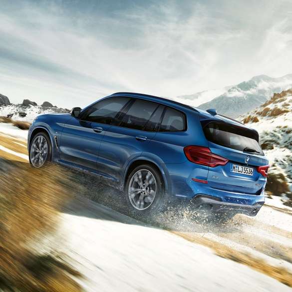 BMW X3 M40i at uphill drive BMW X3 M40i at uphill drive