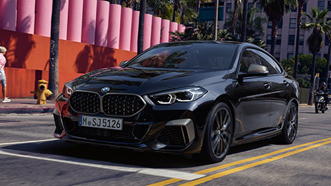 BMW 2 Series Gran Coupé M Automobile F44 MP three-quarter front view standing on the street BMW 2 Series BMW 2 Series Gran Coupé M Automobile F44 MP three-quarter front view standing on the street
