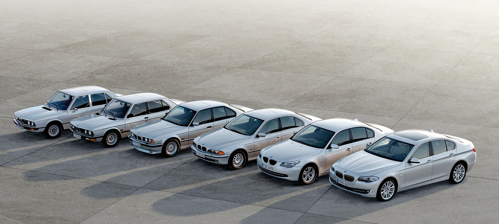 BMW 5 Series Sedan, models from 6 generations standing BMW 5 Series Sedan, models from 6 generations standing