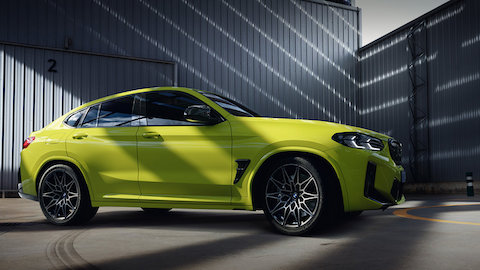 BMW X Series BMW X4 M Automobiles G02 MP three-quarter front view standing with model