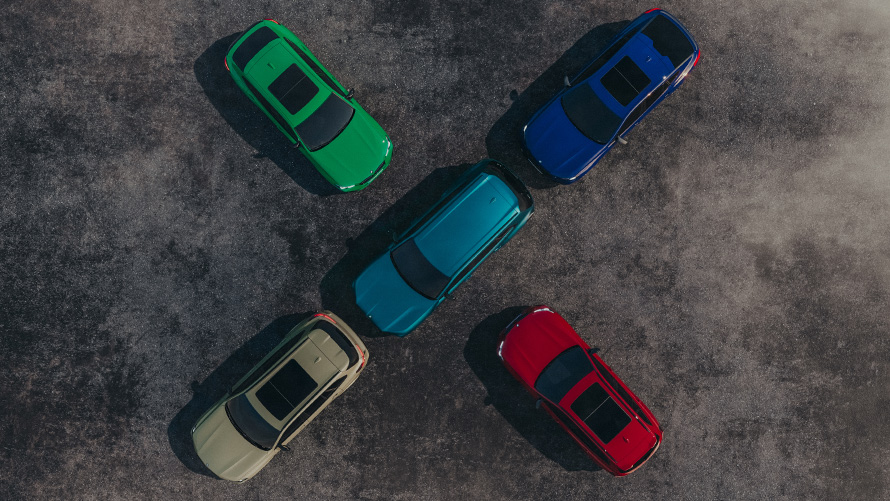 Four different BMW X models in block formation on a country road Four different BMW X models in block formation on a country road