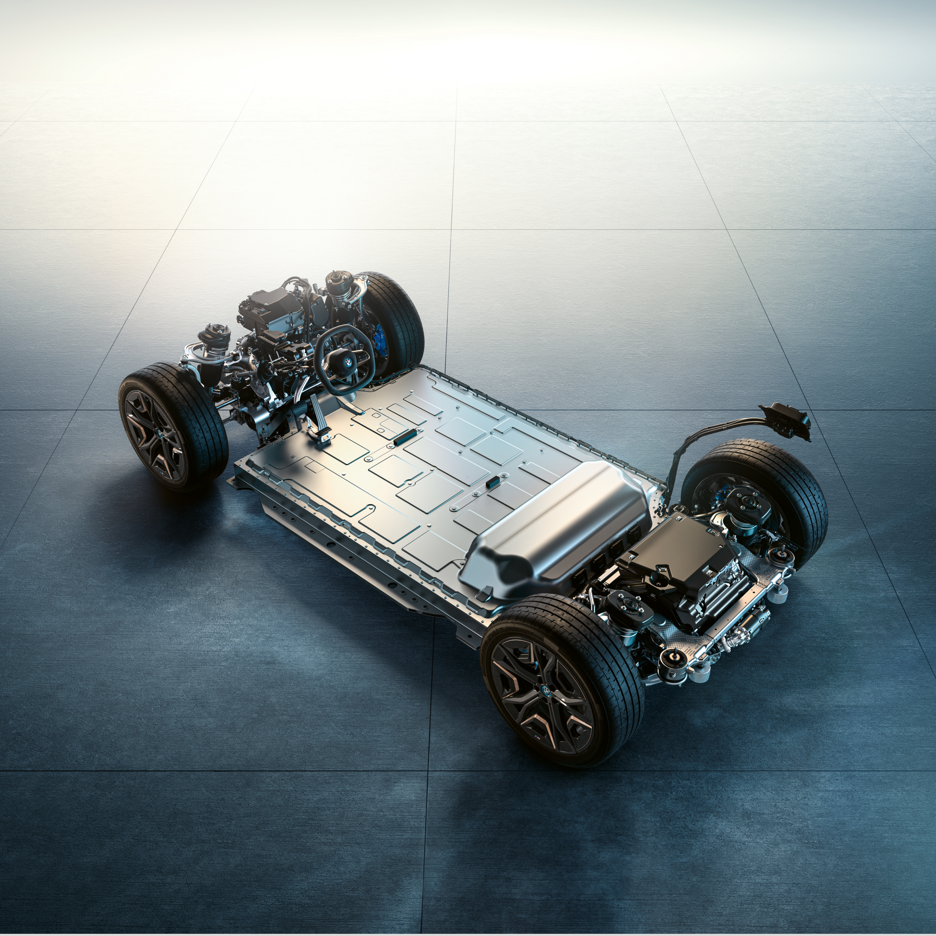 A deconstructed BMW chassis with a battery socket