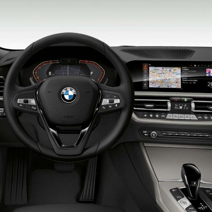 BMW 3 Series Sedan, Model Advantage Cockpit. Frontal close-up of the driver's cockpit of the BMW 3 Series Sedan with model Advantage features.